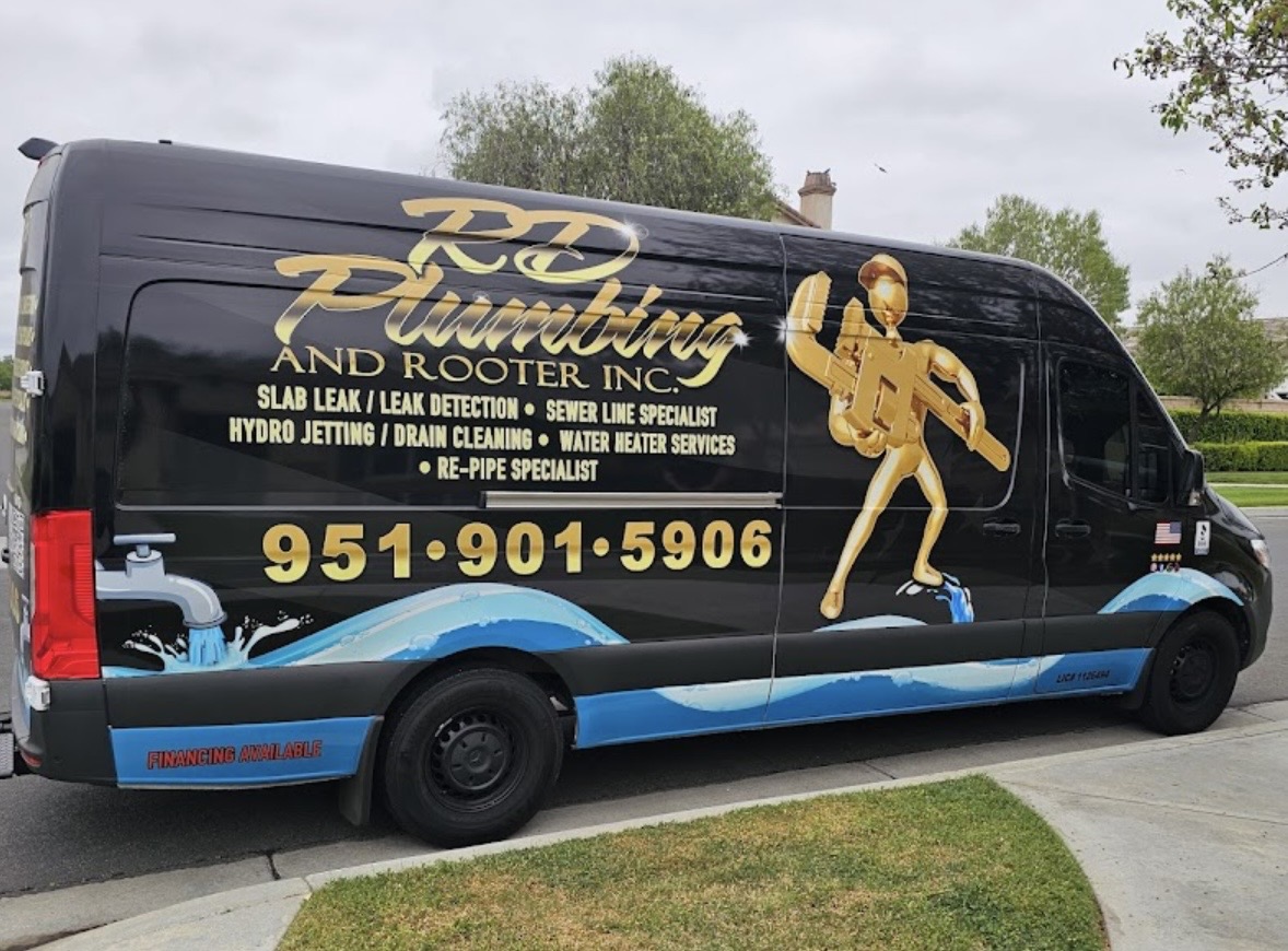 RD Plumbing Sprinter van side panel showing services